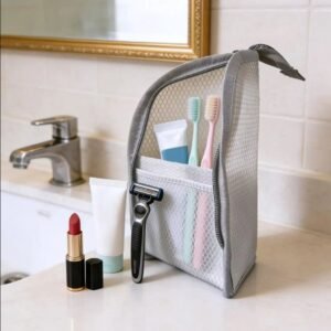 Foldable Travel Toiletry Organizer Foldable travel toiletry organizer standing on a bathroom counter